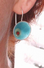 Turquoise enamel earrings.