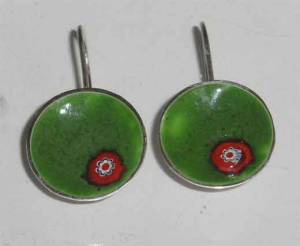 Green earrings .