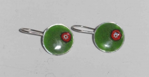 Green earrings .