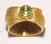 Ring with a peridot.