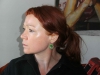 Green earrings .