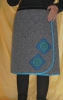 Wrap skirt with african fabric appliques.